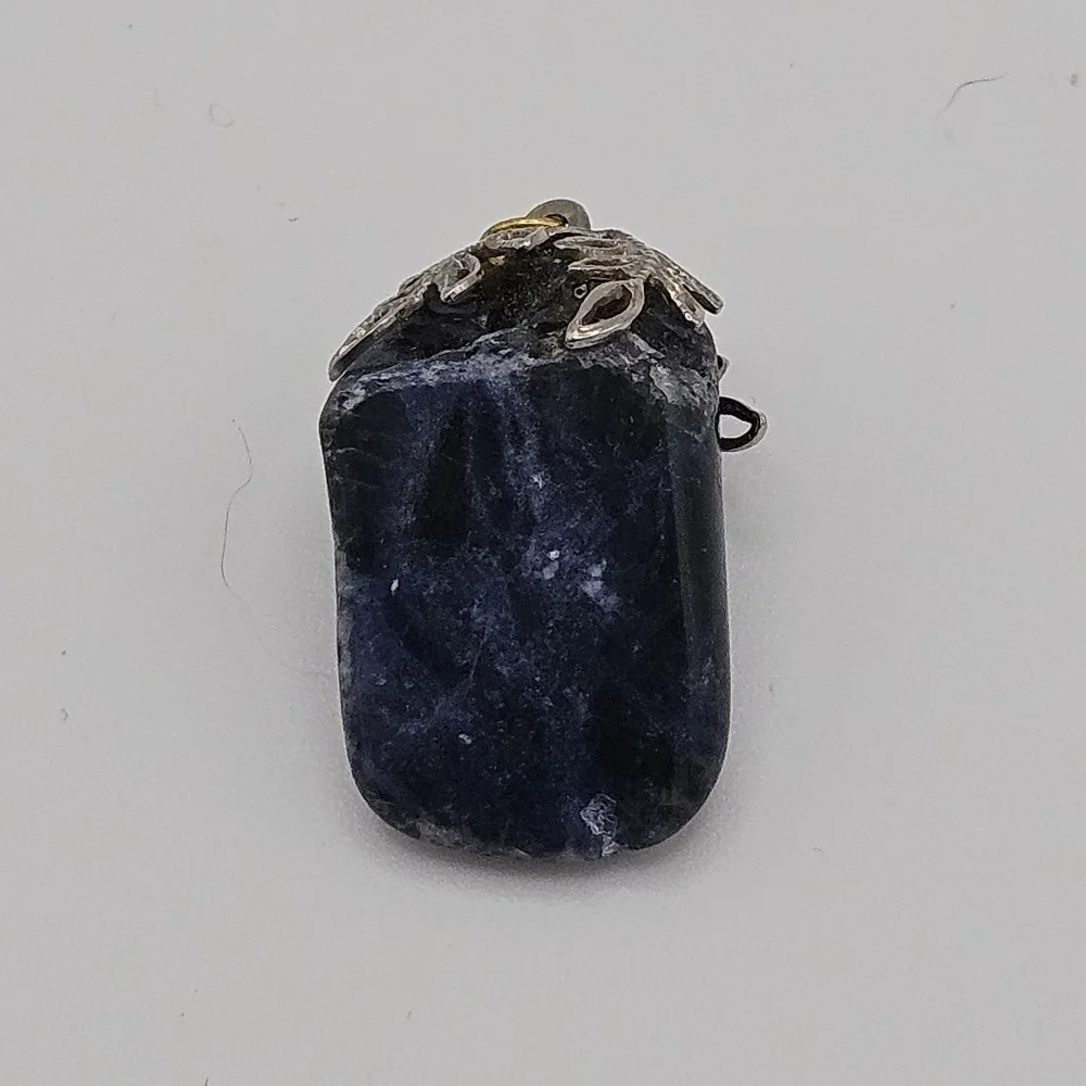 sodalite blue stone pendant with silver tone leafy bail